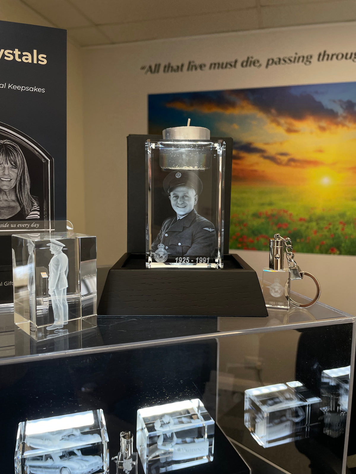 Bespoke Memorial Crystal Candle with engraved RAF portrait on display at Vaudins Funeral Services, Guernsey