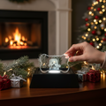 Sarnia3Dcrystals bone-shaped 3D crystal keepsake with a laser-engraved dog portrait on an illuminated LED base.