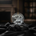 Sarnia3Dcrystals round optical crystal ornament featuring a 3D laser-engraved Les Hanois Lighthouse on a black base.