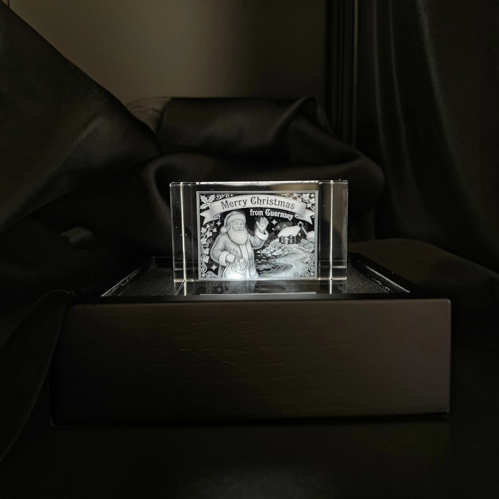 Sarnia3Dcrystals glass block with 3D laser-engraved Santa Claus and Merry Christmas from Guernsey inscription