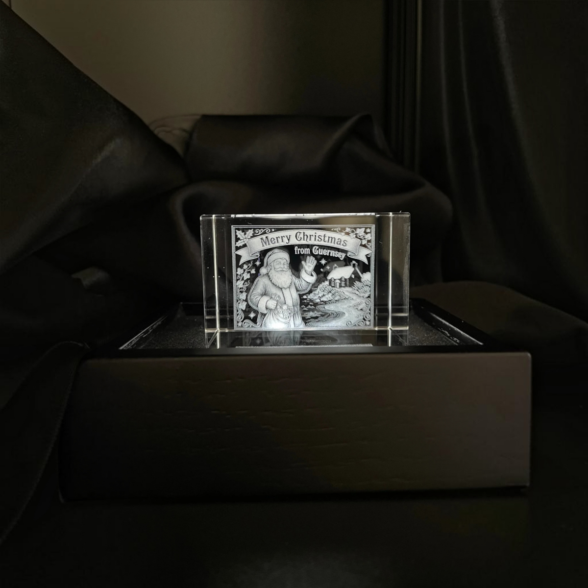 Sarnia3Dcrystals glass block with 3D laser-engraved Santa Claus and Merry Christmas from Guernsey inscription